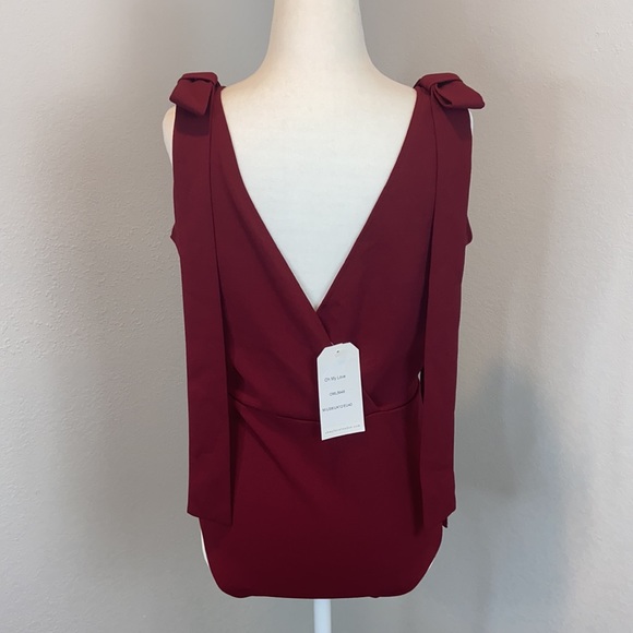 NWT “Oh My Love “ burgundy sleeveless bodysuit with bow accent. Size Med… - Picture 3 of 8